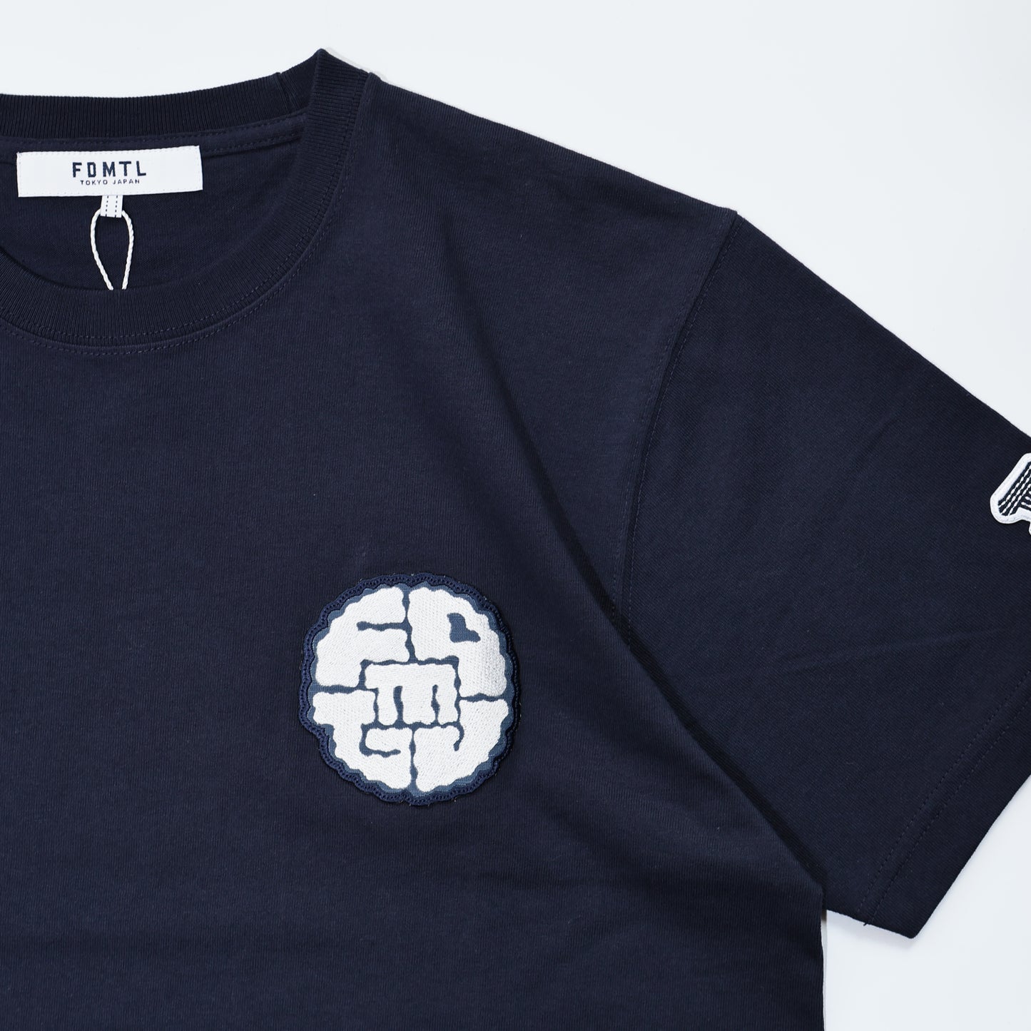 FDMTL FA24/TE33 CIRCLE PATCH TEE NAVY