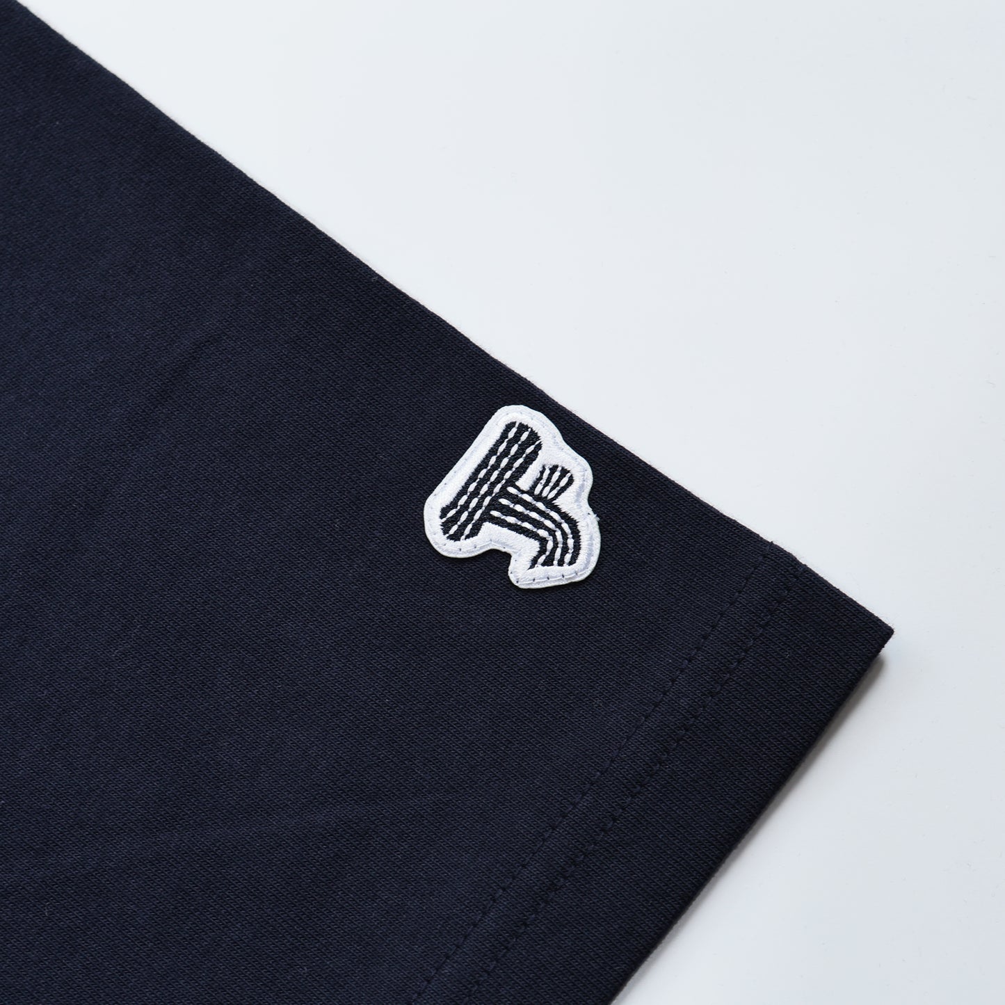 FDMTL FA24/TE33 CIRCLE PATCH TEE NAVY