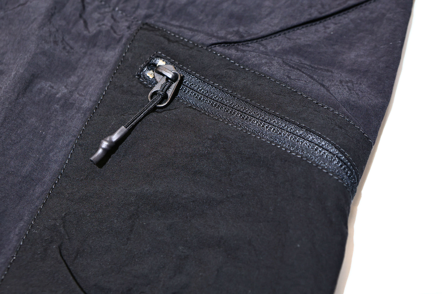 MAHARISHI 5282 VEG DYED ASYM CARGO TRACK PANTS : BLACK